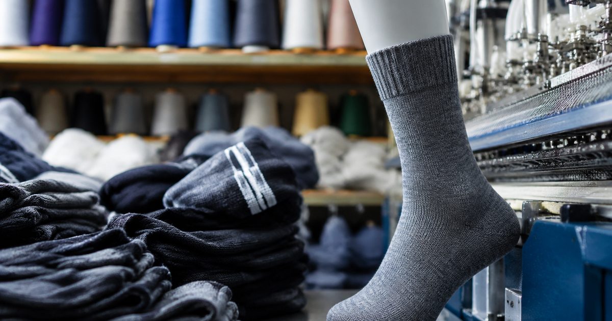 Custom Logo Socks Wholesale: MOQ, Quote Structure, and Landed-Cost Checks for B2B Buyers